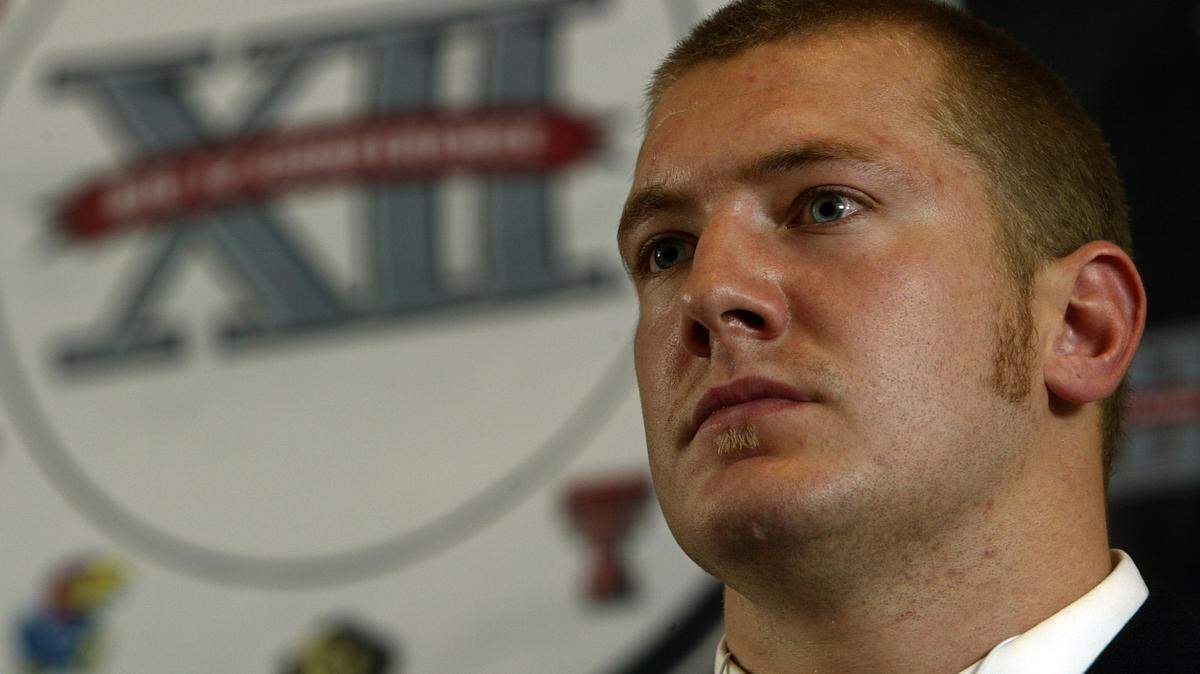 Banks Floodman, University of Kansas linebacker, listens to a question during the Big 12 football media day at the Fairmont Hotel in Kansas City, Mo., in this 2004 file photo.