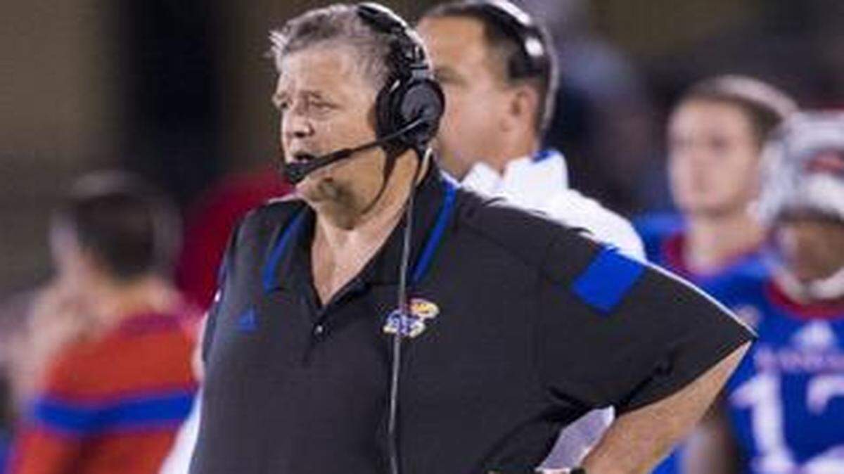 
Kansas Jayhawks football coach Charlie Weis watched from the sidelines during Saturday’s 34-28 victory over Southeast Missouri.
