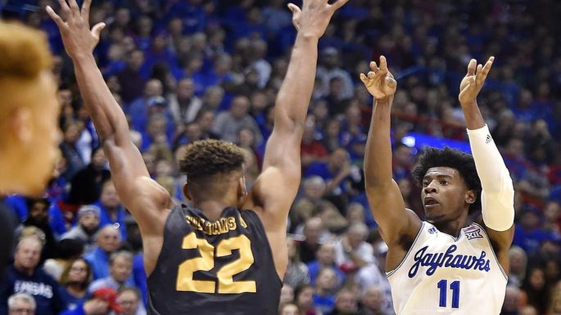 KU’s Josh Jackson nailed a three-pointer over Long Beach State’s LaRond Williams in the first half of the Jayhawks’ 91-61 victory Tuesday at Allen Fieldhouse.