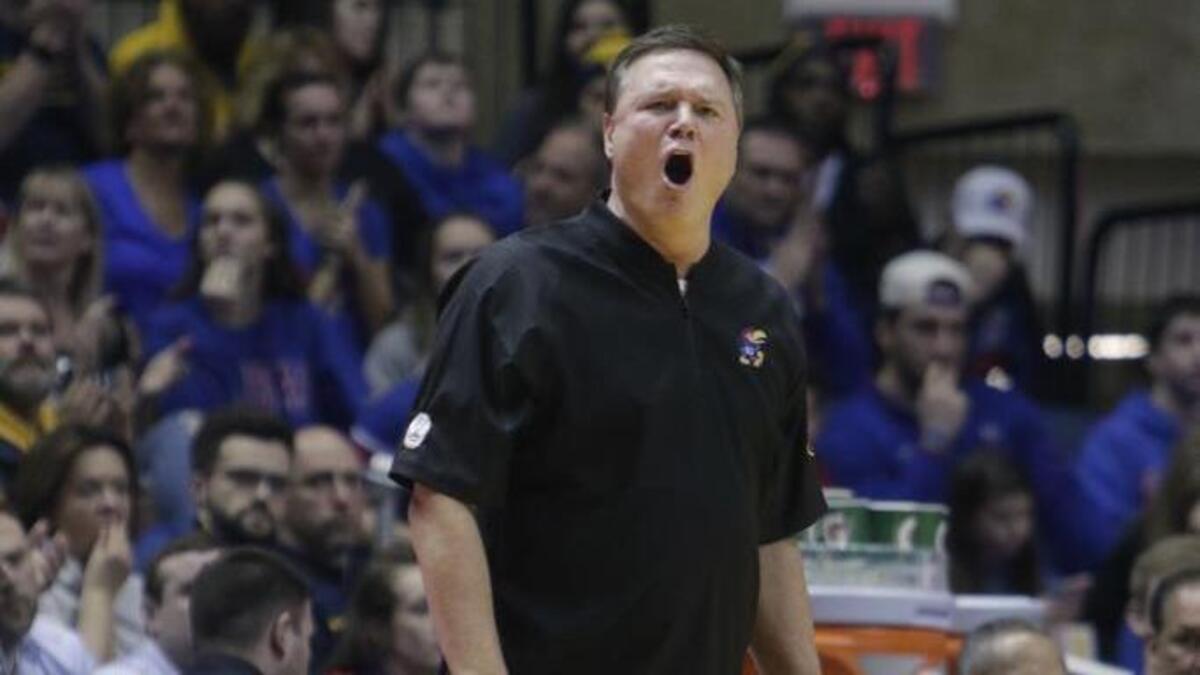KU coach Bill Self sported a different look in a KU-West Virginia game played on Jan. 17, 2018 in Morgantown thanks to a gift from West Virginia coach Bob Huggins.