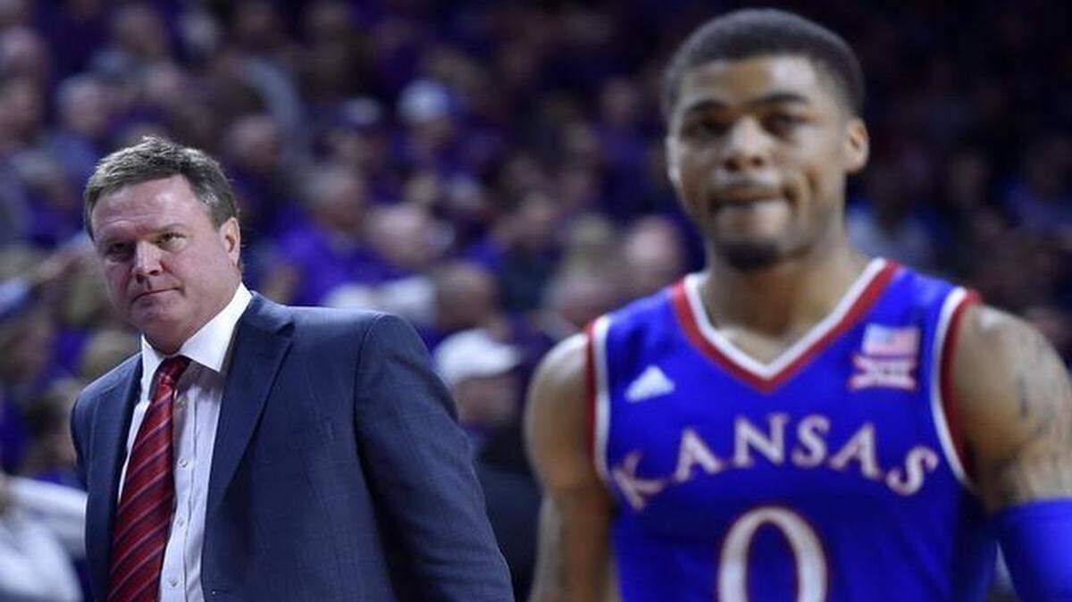 
KU coach Bill Self (left) says he has a simple way to coach Frank Mason (right).
