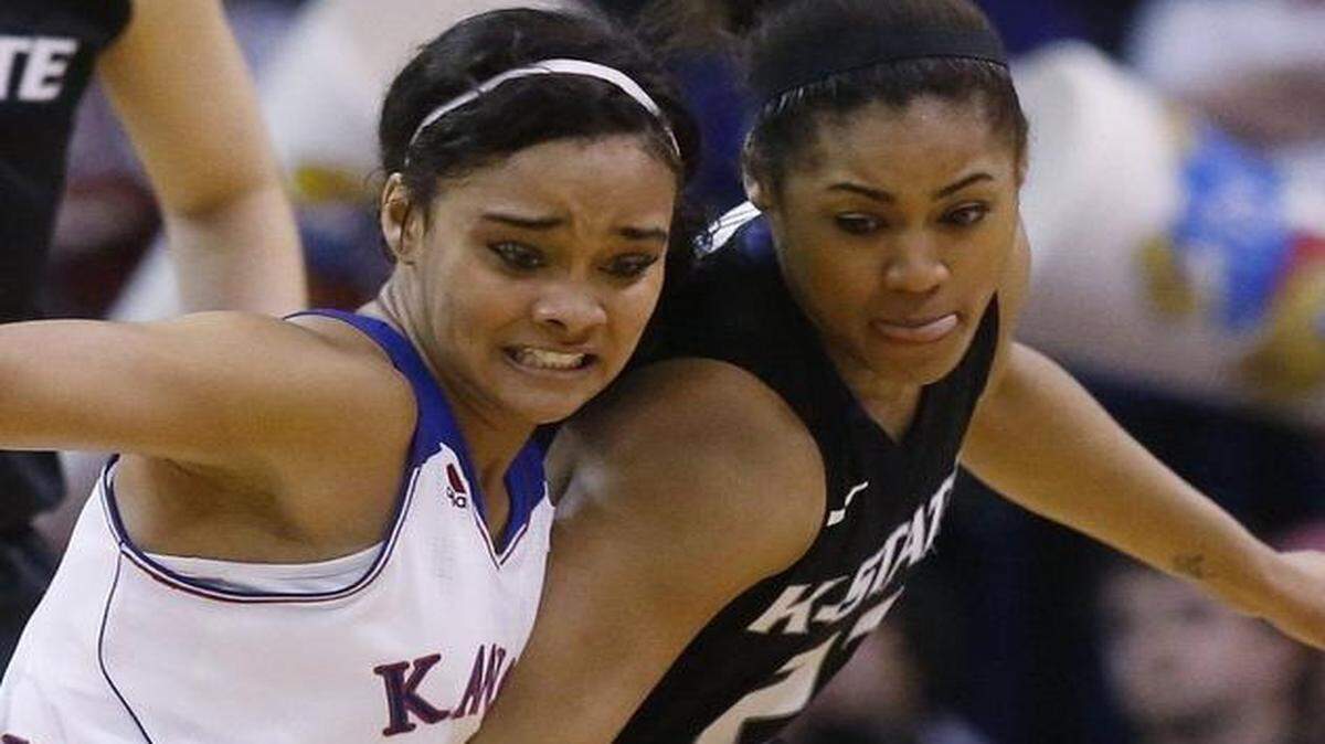 
Kansas State guard Ashia Woods, right, knocks the ball away from Kansas guard Dakota Gonzalez last March.
