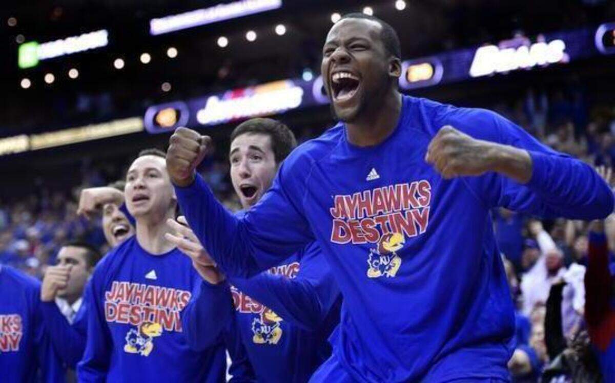 
Cliff Alexander (right) won’t be cheering from the Kansas bench this weekend in Omaha, Neb., as he did Friday against Baylor in the Big 12 Tournament. Alexander did not make the trip with the Jayhawks to the NCAA Tournament while the NCAA investigates his eligibility.
