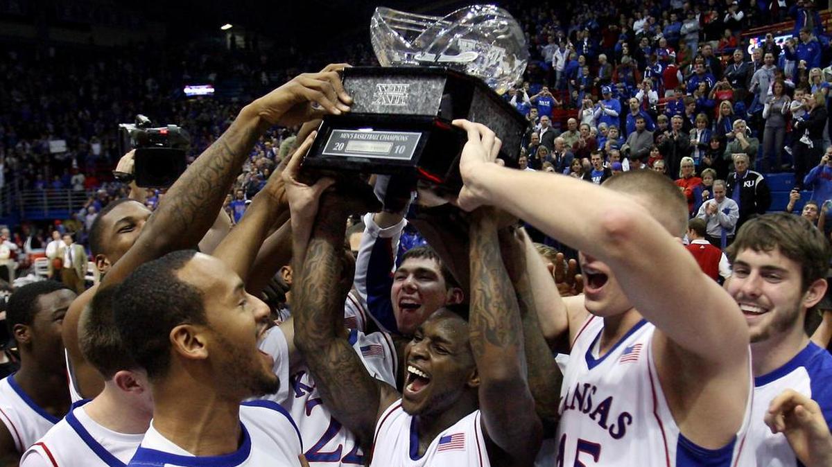 KU senior Sherron Collins and the rest of the Jayhawks hoisted the Big 12 Conference championship trophy over their heads for all the KU fans to see after beating Oklahoma on Feb. 22, 2010. It was the sixth straight regular-season title for coach Bill Self and the Jayhawks.