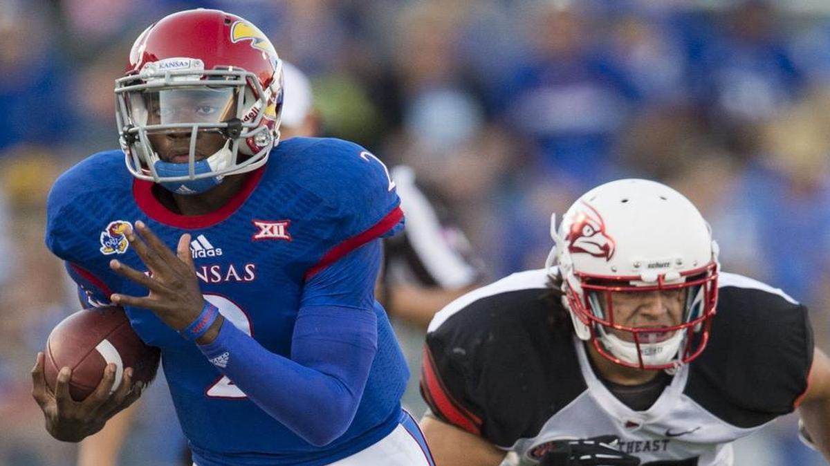 
Kansas quarterback Montell Cozart, left, is one of three team captains for 2015.
