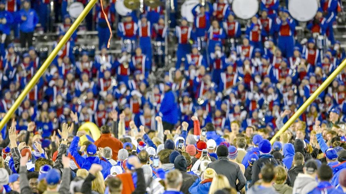 Kansas Jayhawks fans brought down a goal post after Kansas defeated Texas 24-21 in overtime last season at Memorial Stadium in Lawrence.