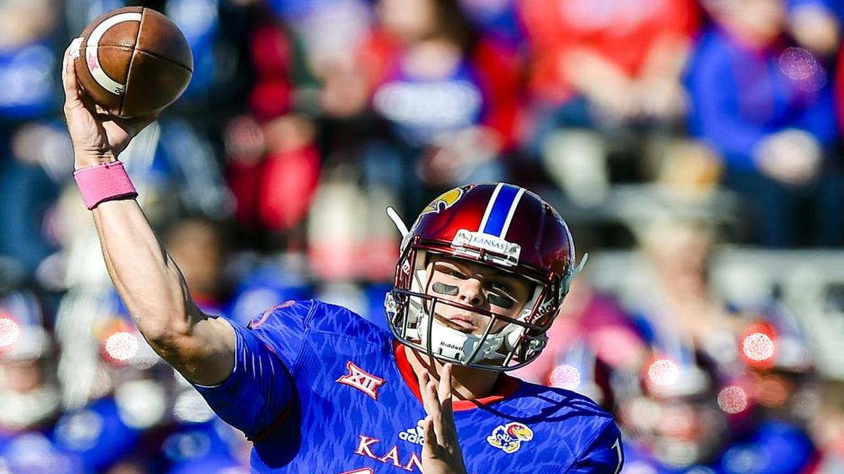 Kansas quarterback Ryan Willis is fun to coach because “you can get after him,” said KU coach David Beaty. “He absorbs it, and he tries to move forward.”