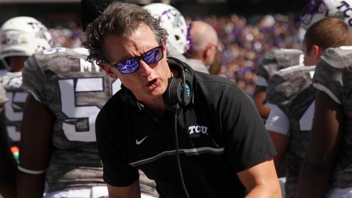 Doug Meacham talks to TCU players during a game last year against Iowa State.