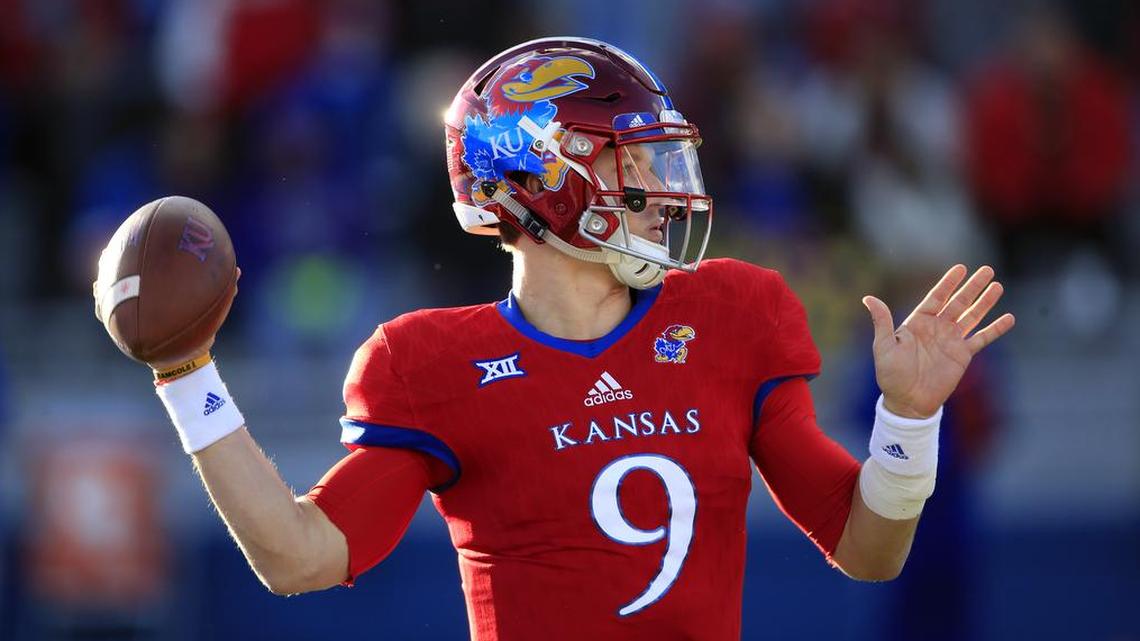 Kansas quarterback Carter Stanley was poised to pass during the first half of an NCAA college football game against Oklahoma in Lawrence, Kan., Saturday, Nov. 18, 2017.