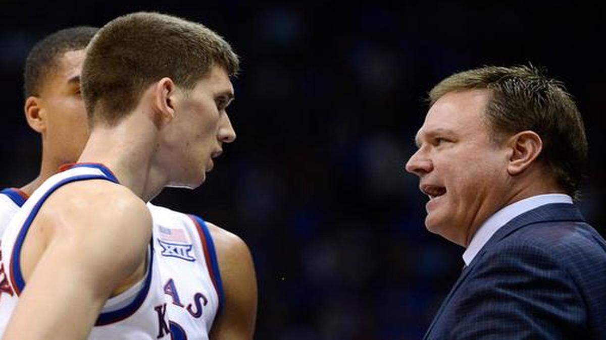 
KU freshman Sviatoslav Mykhailiuk (left) and Kansas coach Bill Self chat during the second half of last Monday's exhibition game at Allen Fieldhouse.
