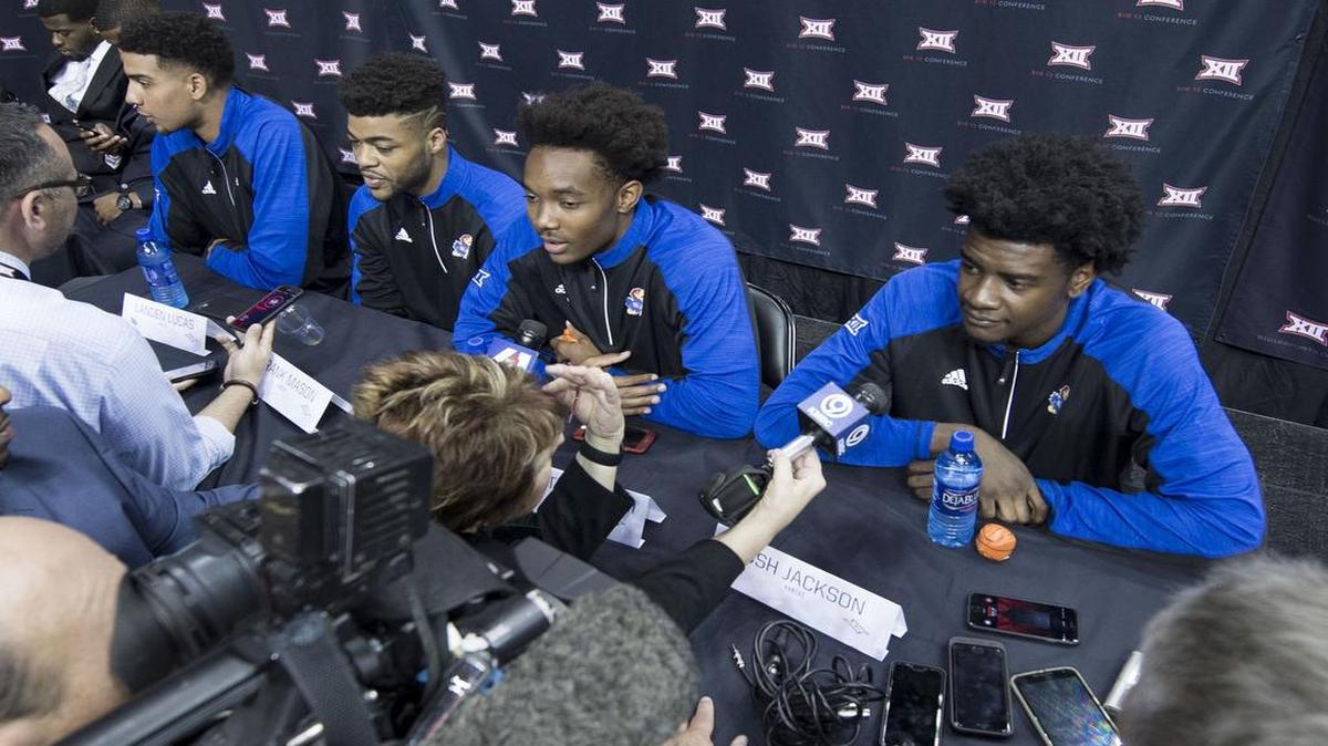 Kansas guard Devonté Graham (third from left) isn’t a fan of preseason honors.