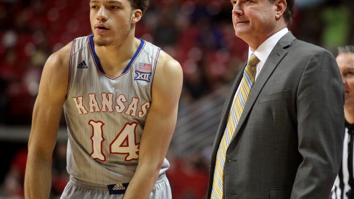 Brannen Greene (left) played for a minute Saturday before coach Bill Self pulled him because of a defensive lapse.