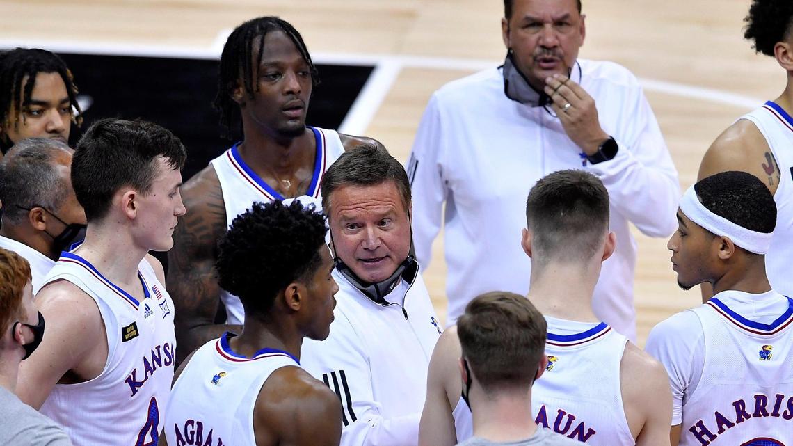 KU coach Bill Self talks to his team during a timeout during a Big 12 Conference men’s basketball tournament game in March 2021 at the T-Mobile Center in Kansas City.
