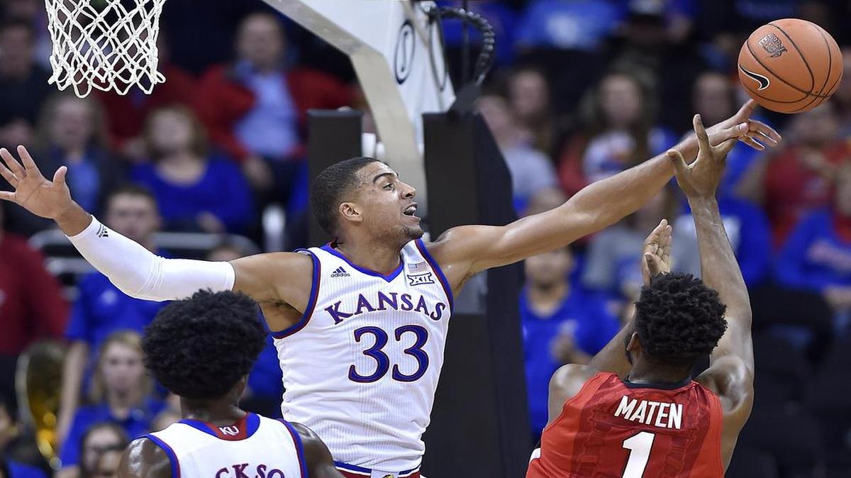 KU’s Landen Lucas rejected a shot by Georgia’s Yante Maten during the first half of Tuesday’s 65-54 CBE Hall of Fame Classic title game victory at the Sprint Center.