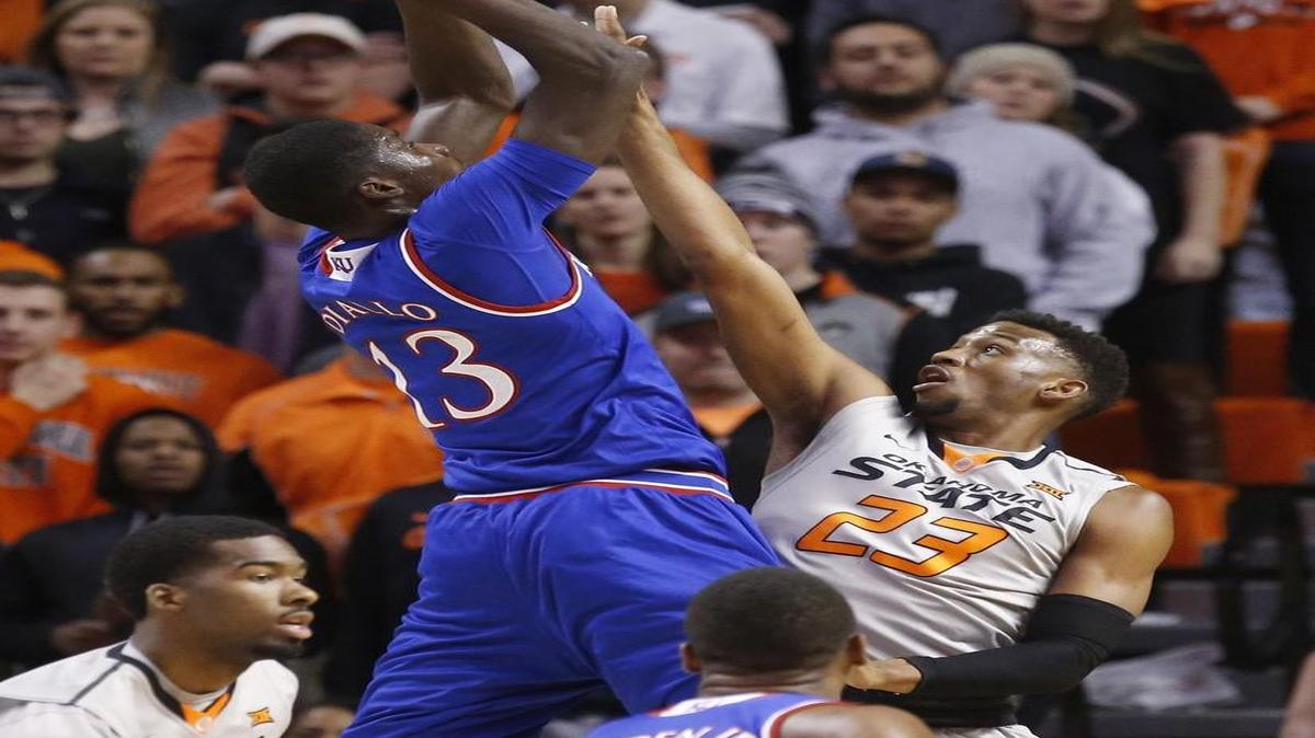 Kansas forward Cheick Diallo (left) made his first start Tuesday against Oklahoma State.