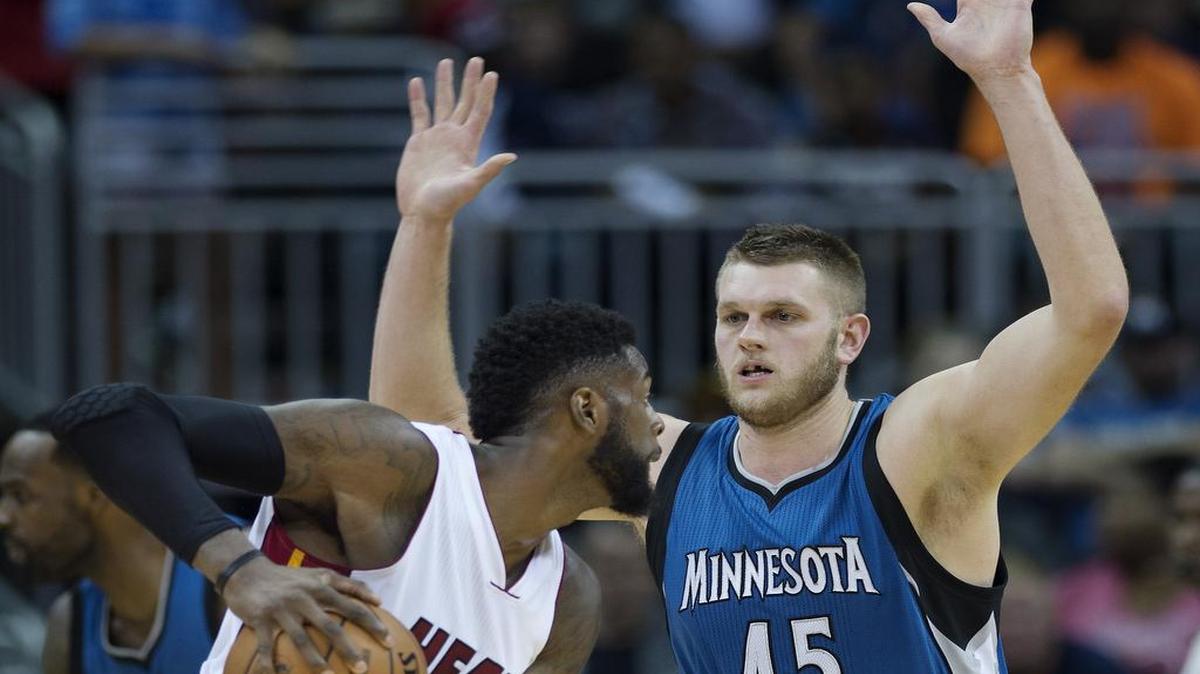 Former KU player Cole Aldrich (right) played for the Timberwolves against Willie Reed and the Heat in an exhibition game in 2016 at the Sprint Center.