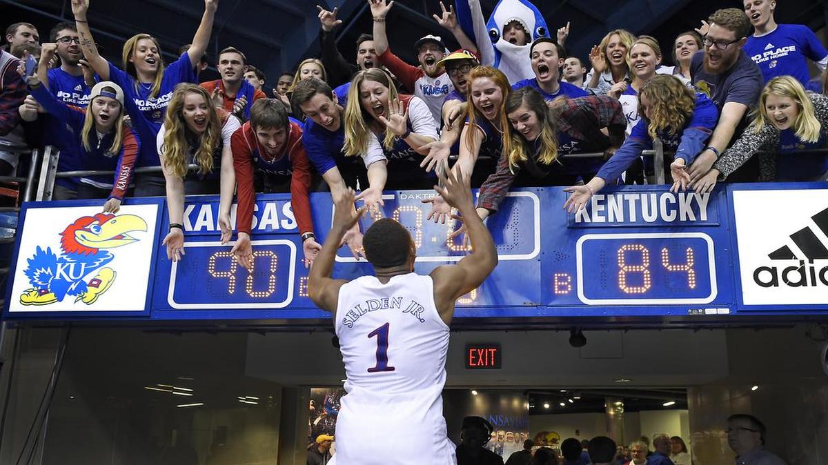 After pouring in a career-high 33 points, KU's Wayne Selden gave the ultimate high five, or make that ten, after the Jayhawks took down Kentucky 90-84 in overtime Saturday night Jan. 30, 2016, at Allen Fieldhouse.