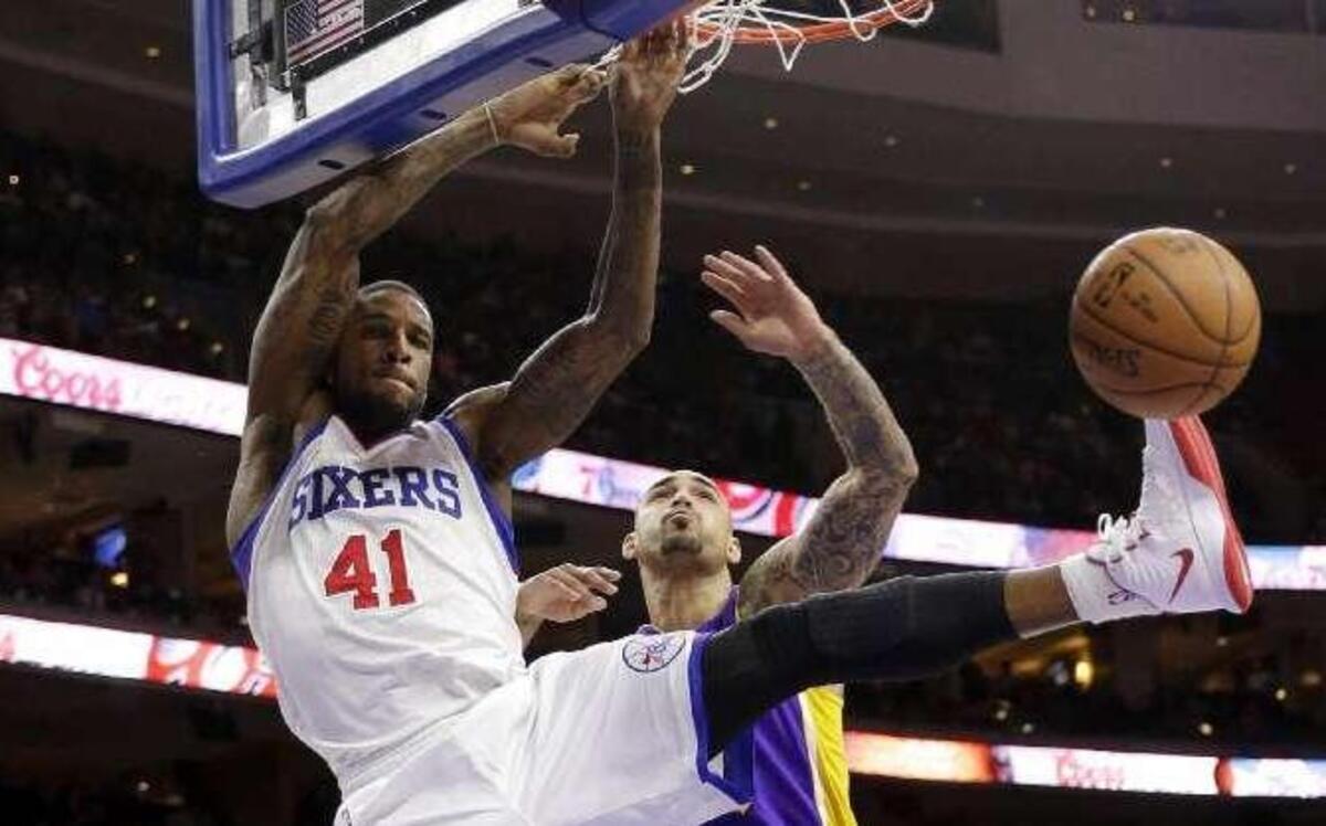 Former KU forward Thomas Robinson (left) played against the Lakers when he was with the 76ers. Now, Robinson has signed with the Lakers.
