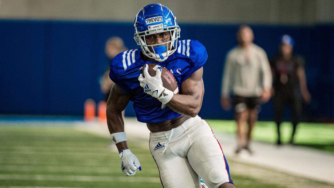 Kansas receiver Trevor Wilson moves up the field during a practice on Aug. 11, 2021, at the KU football indoor practice facility.