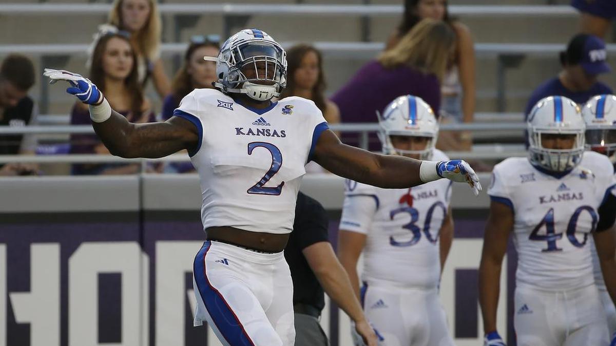 Kansas defensive end Dorance Armstrong Jr. (2) warms up before a game against TCU