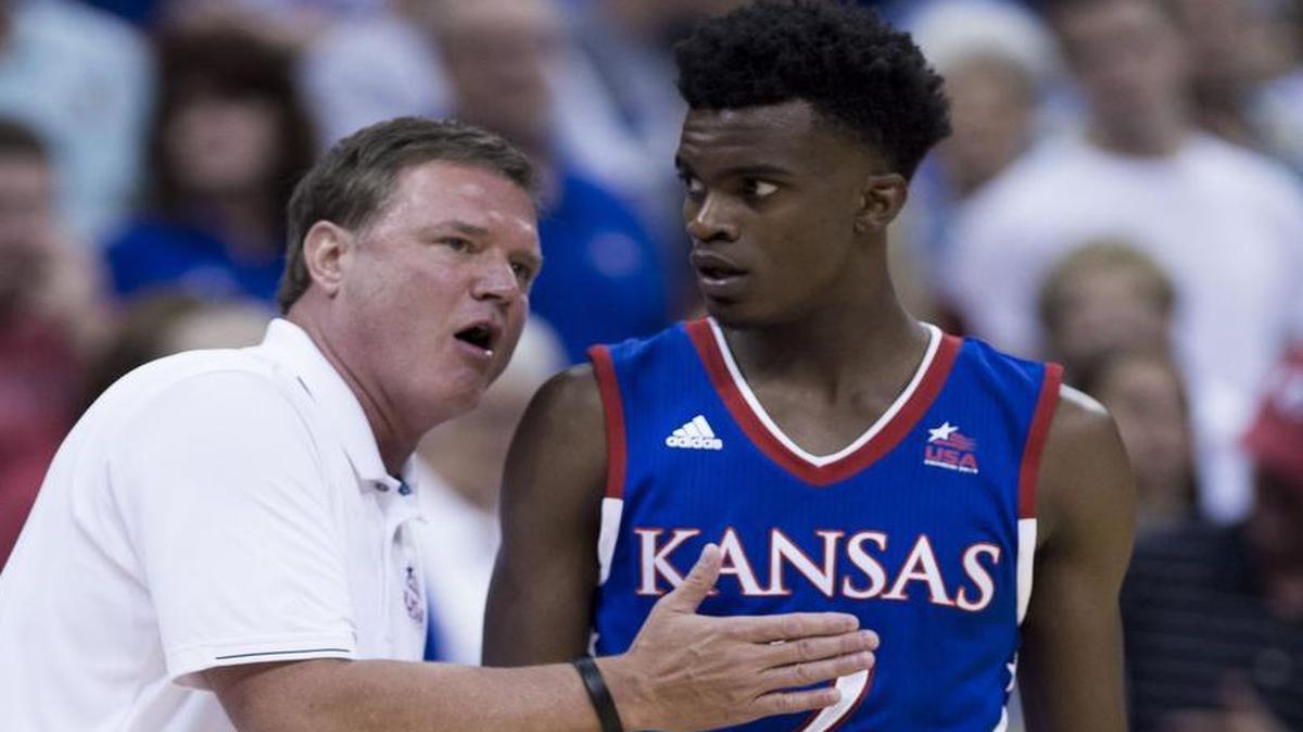 Kansas men’s basketball coach Bill Self (left) and guard Lagerald Vick during a June 23, 2015, exhibition game at the Sprint Center in Kansas City, Missouri.