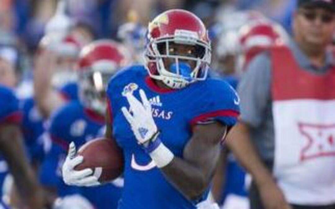 
Kansas Jayhawks wide receiver Tony Pierson (3) reeled off a long run against Southeast Missouri but during a 23-0 loss to Texas on Saturday, he finished with just four touches — three catches for 31 yards and one rushing attempt for three yards.
