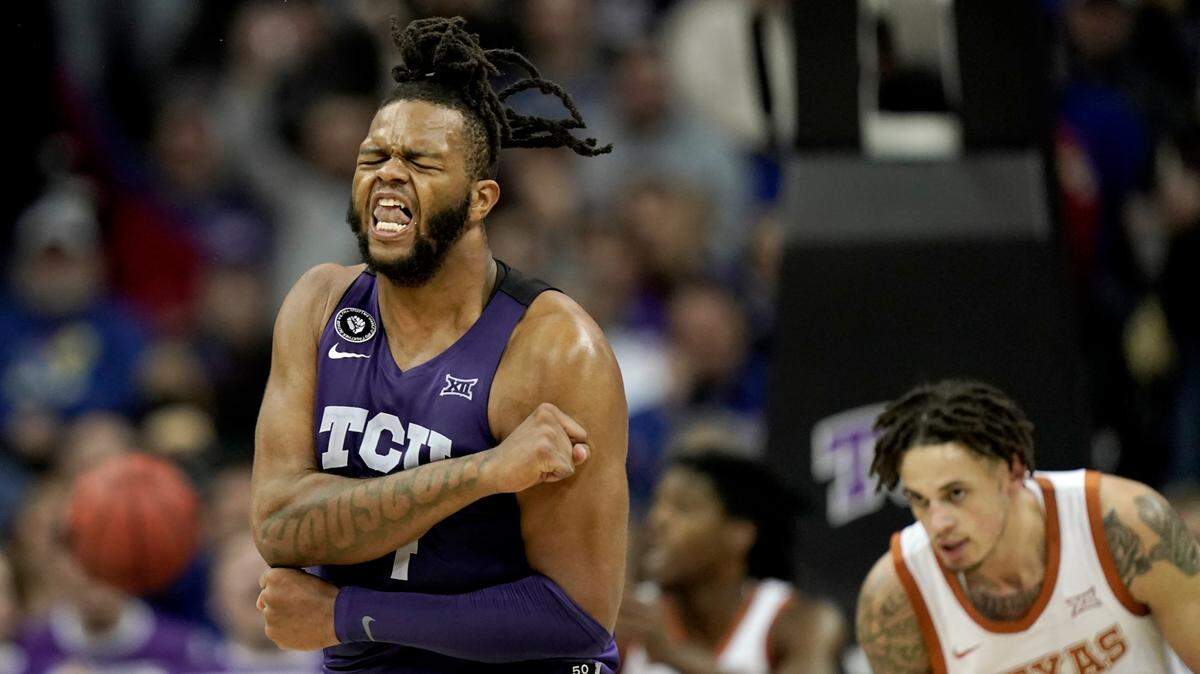 TCU forward Eddie Lampkin flexes during the second half of a game in the quarterfinal round of the Big 12 Tournament in Kansas City, Mo., Thursday, March 10, 2022. TCU won, 65-60.
