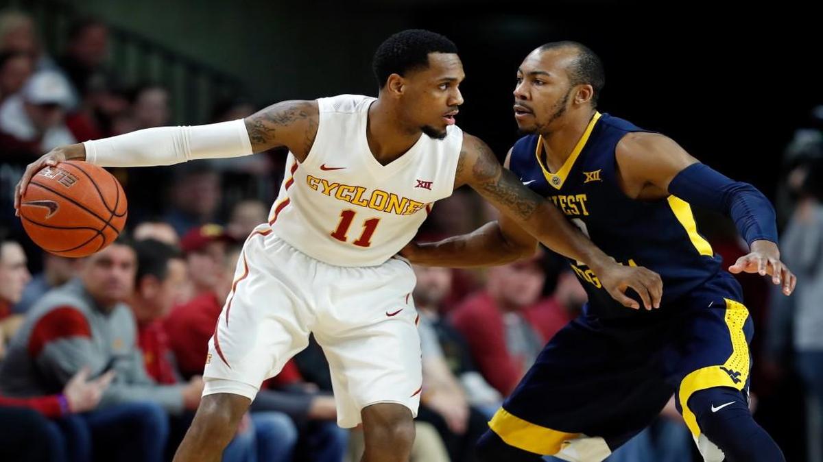 Iowa State guard Monte Morris drives past West Virginia guard Jevon Carter, right, during the first half on Jan. 31 in Ames, Iowa.