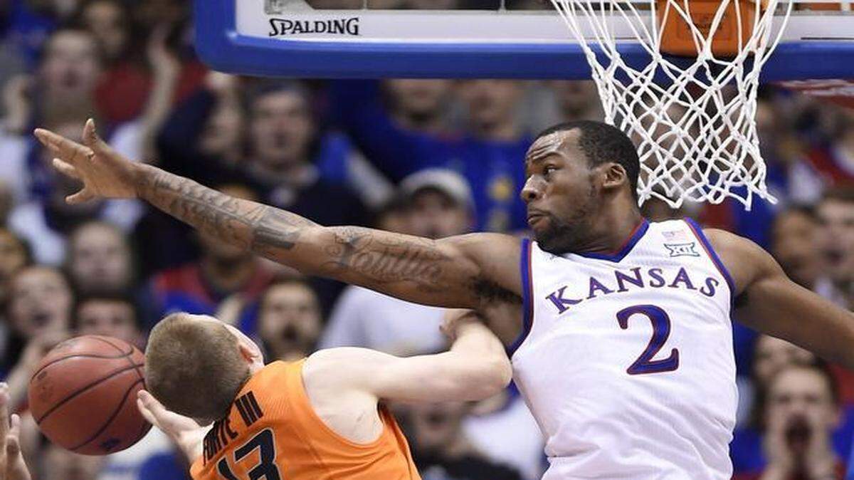 
Kansas’ Cliff Alexander blocked a shot by Oklahoma State’s Phil Forte during a game earlier in the season.

