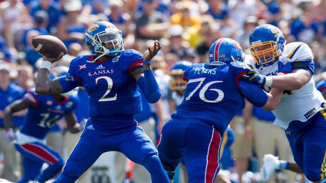 
Kansas quarterback Montell Cozart (2) delivered a pass in the second quarter of Saturday’s game against South Dakota Statein Lawrence.
