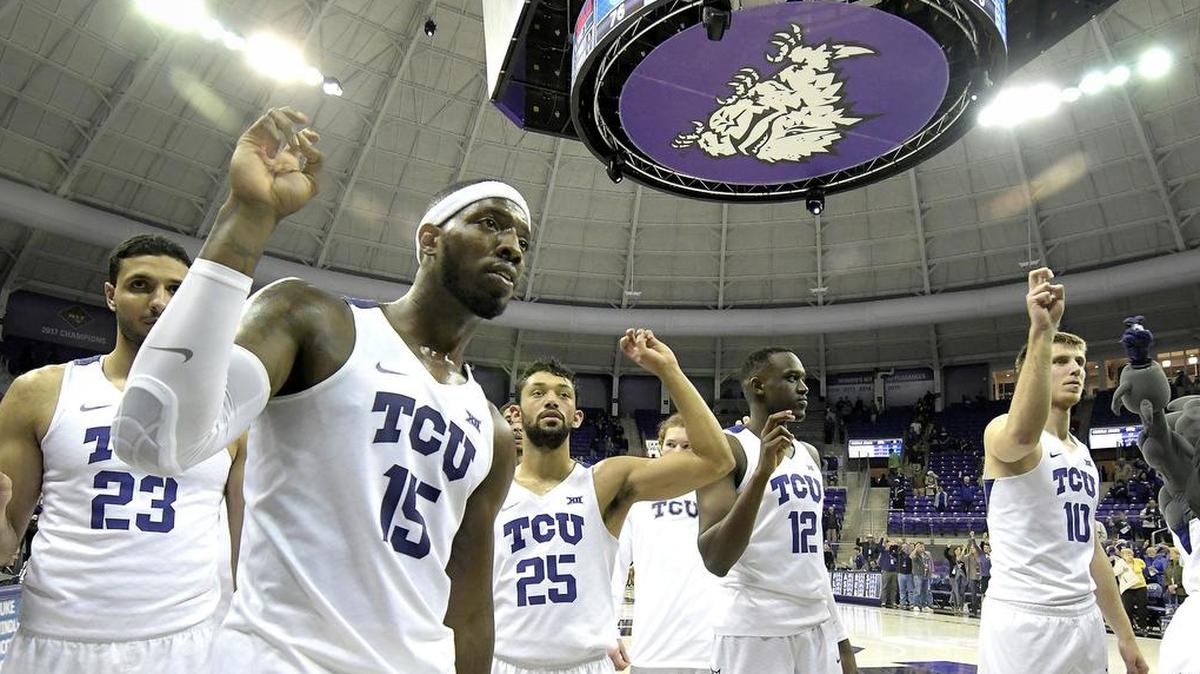 TCU Horned Frogs forward Ahmed Hamdy-Mohamed (23), forward JD Miller (15), guard Alex Robinson (25), forward Kouat Noi (12) and forward Vladimir Brodziansky (10) sing the school song after they beat Belmont 87 to 76 in college basketball at the Schollmaier Arena in Fort Worth, TX, Wednesday, Nov. 29, 2017.