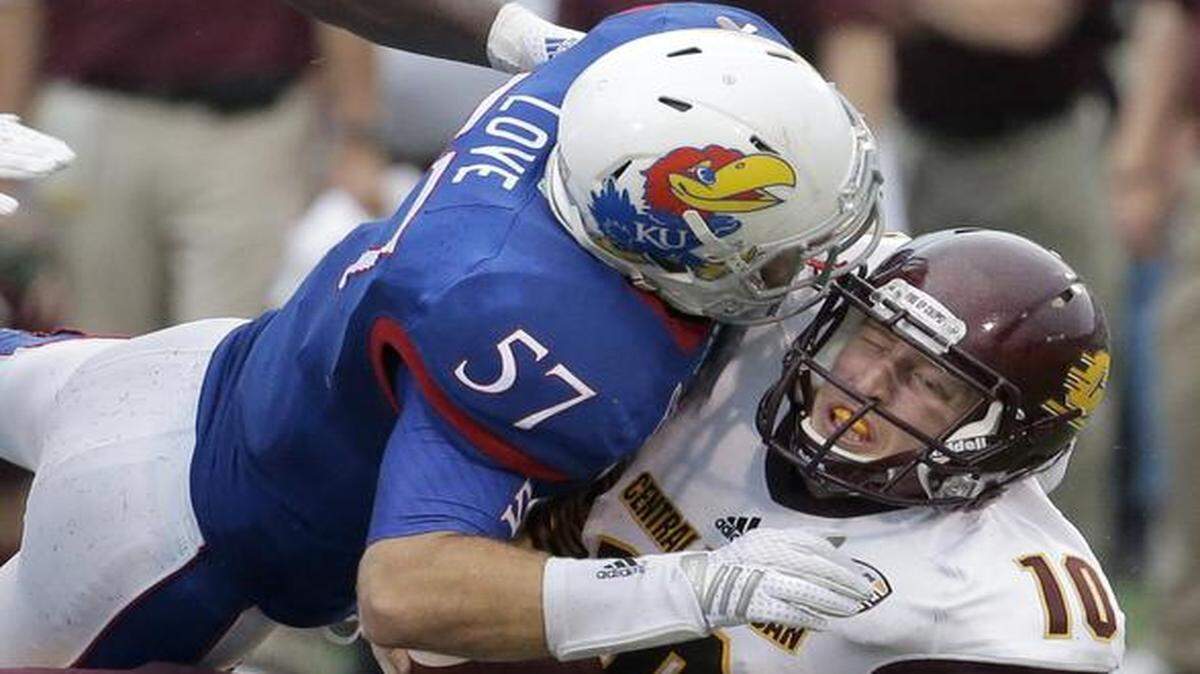 
Kansas linebacker Jake Love sacked Central Michigan quarterback Cooper Rush during last Saturday’s game.
