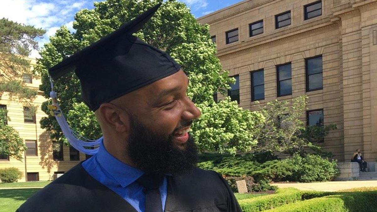Drew Gooden enjoyed the fruits of his academic labor on Sunday during KU’s commencement exercises.