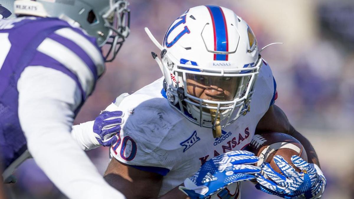 Kansas running back Khalil Herbert (right) ran for 189 yards in 44 carries as a freshman last season.