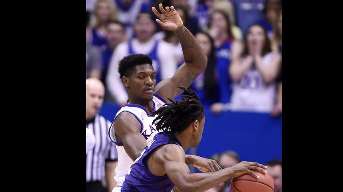 KU’s Silvio De Sousa (left) saw his first action of the season against K-State at Allen Fieldhouse last month.