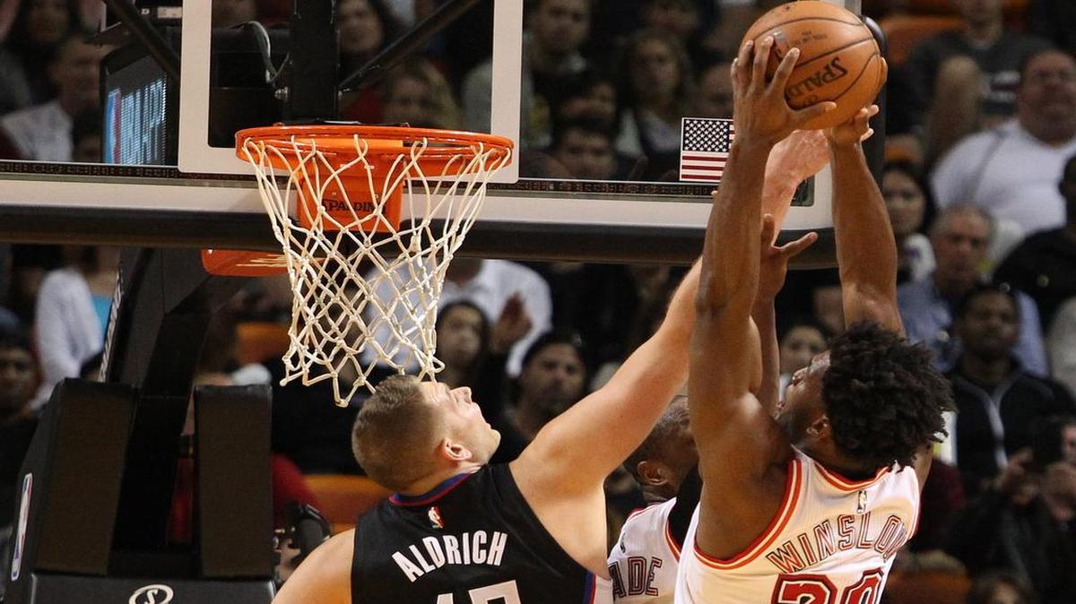 Cole Aldrich (left) has signed with the Minnesota Timberwolves, who are playing the Miami Heat in a NBA preseason game Oct. 8 at the Sprint Center.