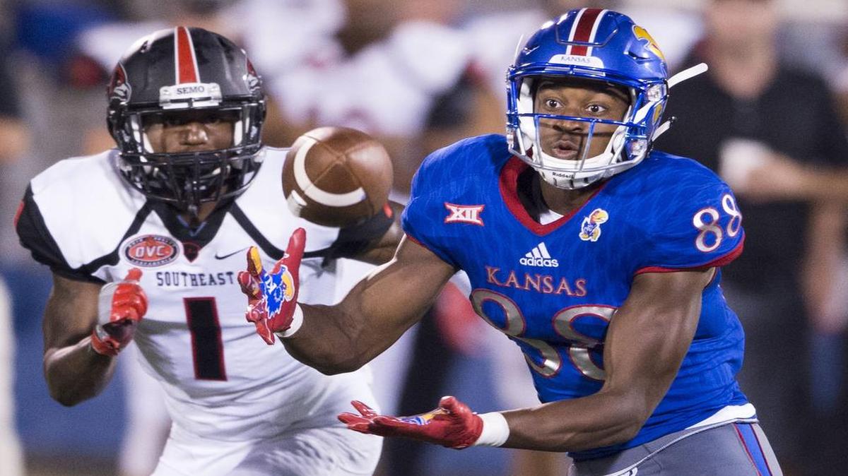 Kansas Jayhawks wide receiver Jeremiah Booker (88) caught a pass in front of Southeast Missouri State cornerback Al Young (1) in the fourth quarter on Saturday, September 2, 2017. Kansas beat Southeast Missouri State 38-16.