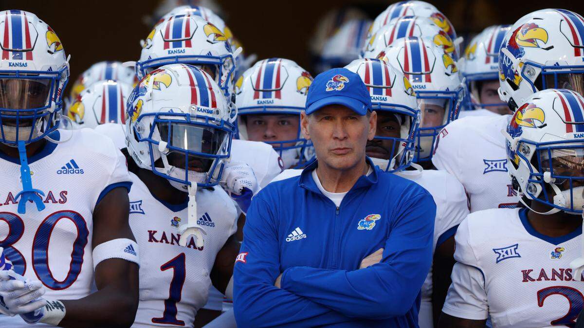 Kansas head coach Lance Leipold stands with his team before playing TCU in a game Saturday, Nov. 20, 2021, in Fort Worth, Texas. TCU won 31-28.