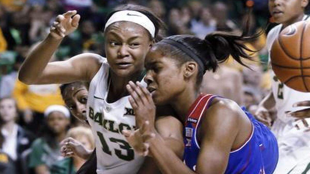 
Baylor forward Nina Davis (left) joined Kansas’ Chelsea Gardner (right) in the 10-player All-Big 12 first team. Davis also was voted Big 12 women’s player of the year. The pair faced off last month in Waco, Texas.
