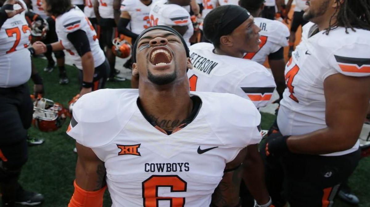 
Oklahoma State's Ashton Lampkin celebrates his team's win over Texas on Saturday in Austin.
