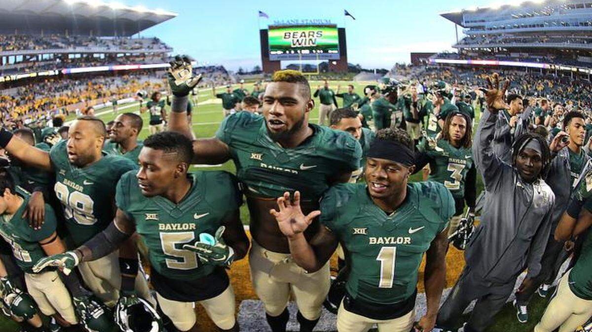 
Baylor football players celebrated a victory over Kansas on Saturday.
