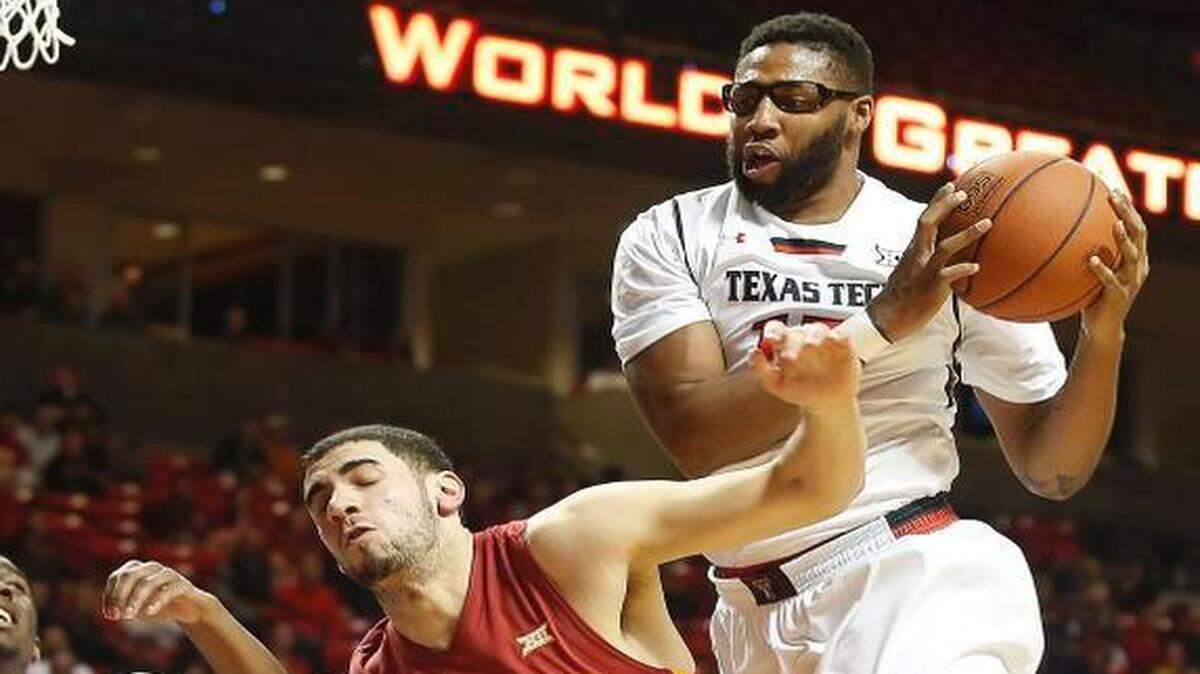 
Texas Tech’s Aaron Ross (right) grabbed a rebound away from Iowa State’s Georges Niang on Jan. 24 in Lubbock, Texas.


