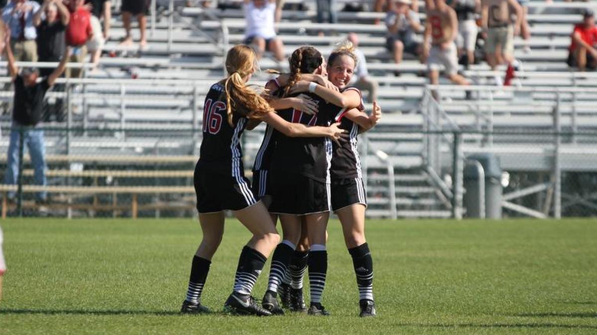Benedictine players celebrated after scoring the lone goal in the semifinals win in the NAIA soccer tournament in Orange Beach, Ala.