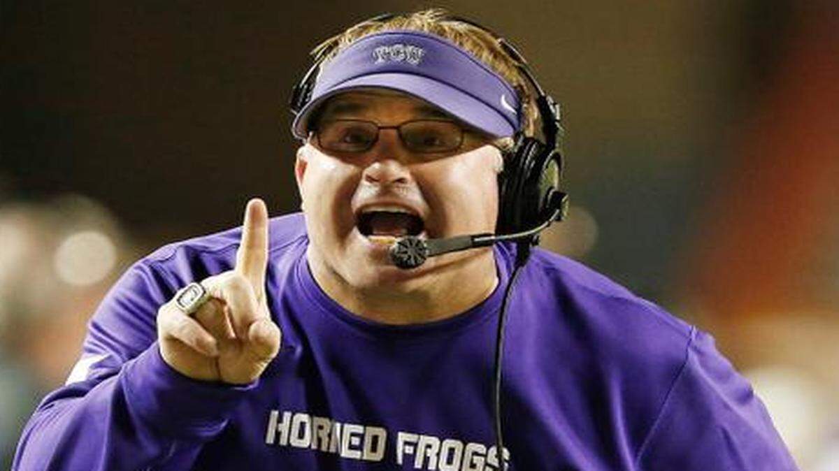 
The Oregon-Ohio State winner will be college footall’s national champion, but polls will rank the rest of the top 25, and the loser of the first College Football Playoff championship game will have two losses and in the final wire-service polls could find itself behind a one-loss team such as coach Gary Patterson’s TCU Horned Frogs.
