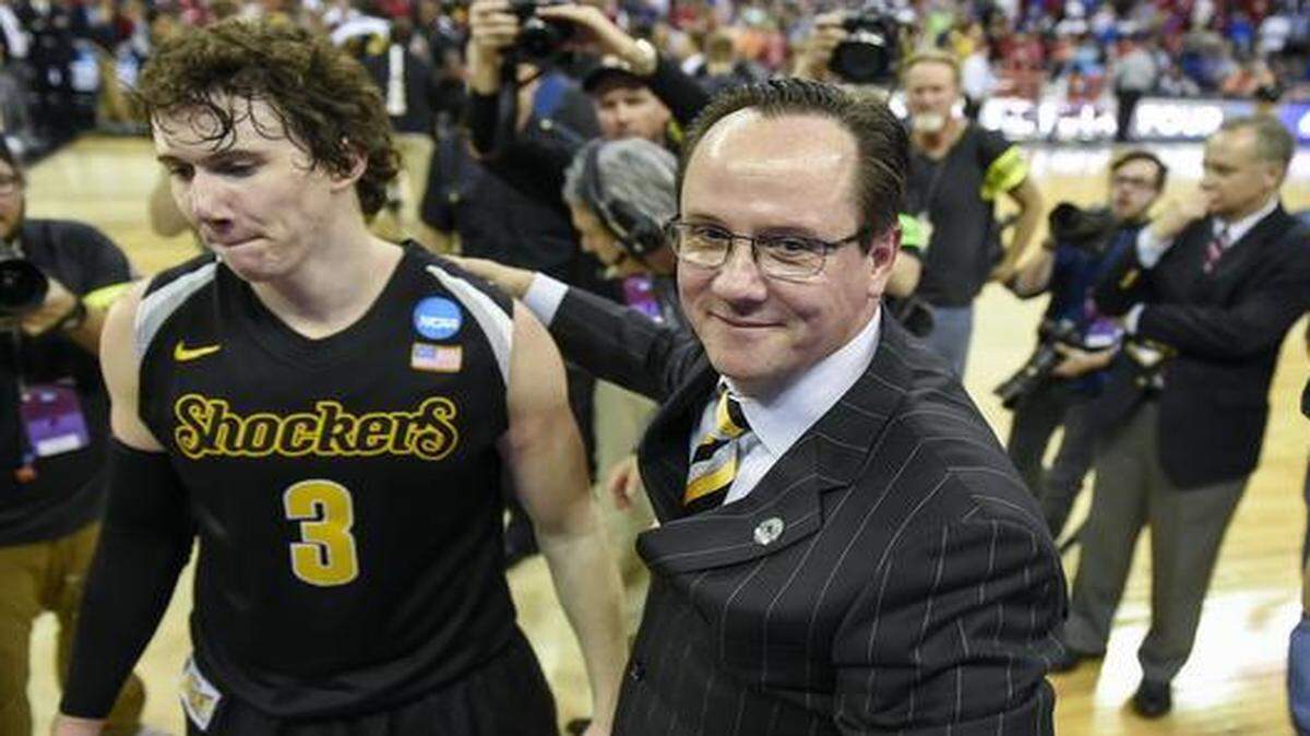 
One of the highlights of Wichita State’s season was its victory over Kansas last month. Head coach Gregg Marshall hugged guard Evan Wessel after the game. A boost in pay will help keep Marshall with the Shockers next season. 


