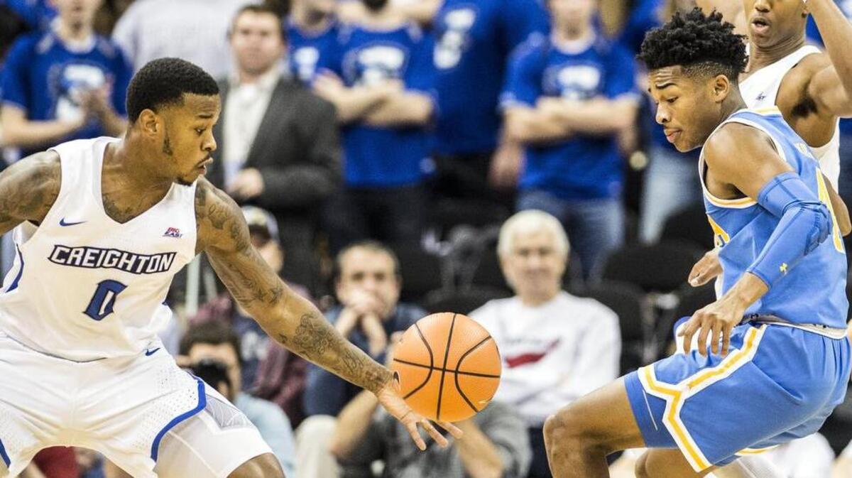 Creighton guard Marcus Foster (left) stole the ball from UCLA guard Jaylen Hands in Monday’s Hall of Fame Classic semifinal at the Sprint Center. Foster, who played his first two seasons at Kansas State, scored 23 points in a 100-89 victory.