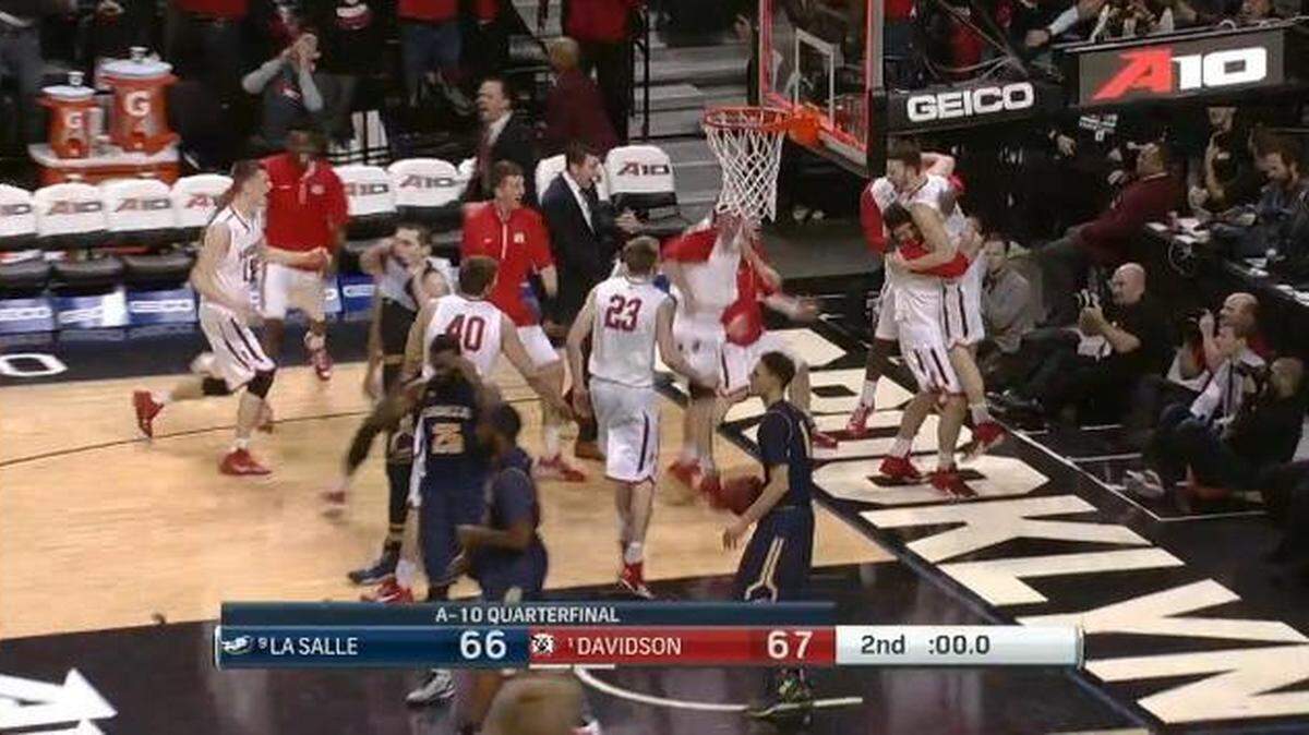 
Tyler Kalinoski (top right), a former standout at Olathe East, beat the clock with a driving layup that gave No. 24 Davidson a 67-66 victory over La Salle.
