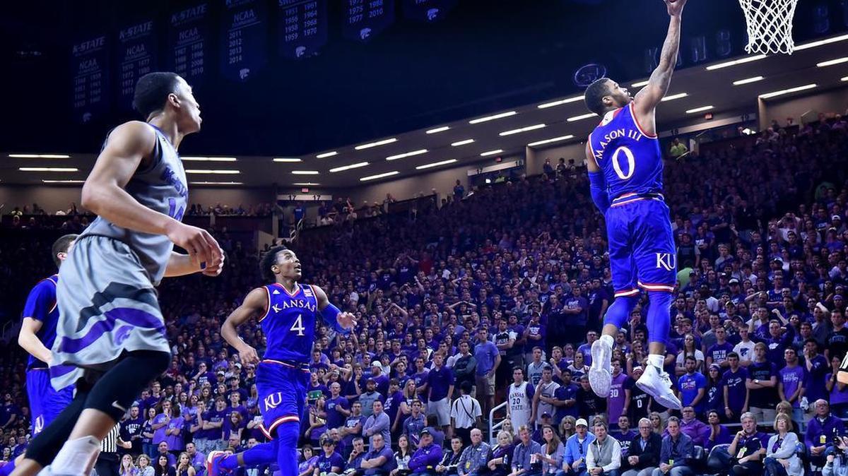 After going behind his back with the ball, KU's Frank Mason found himself all alone for an easy layup during the second half of Saturday's game at Bramlage Coliseum in Manhattan, Ks. KU won, 72-63.