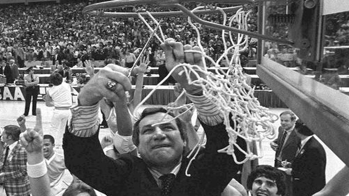 
North Carolina basketball coach Dean Smith won his first of two NCAA championships in 1982 when the Tar Heels defeated Georgetown 63-62 in New Orleans.
