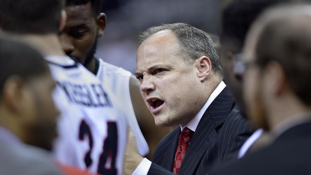 Georgia coach Mark Fox motivates his players just before the start of the second half of Monday night's CBE Classic game against George Washington.
